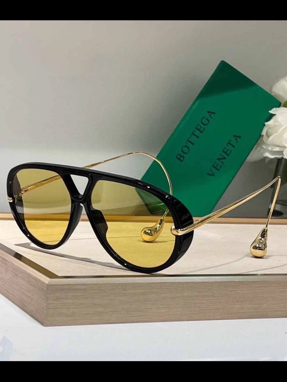Bottega Veneta Black Frame with Gold Temples and Yellow Lenses Sunglasses